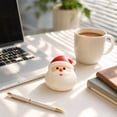 thumbnail image 4 of 3.94" Santa Bun Squishy Toy with Christmas Display Stand, Soft Holiday Fidget Figure for Desk Decor & Party Favors, 4 of 5
