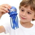 thumbnail image 5 of Jellyfish Shape Squeeze Ball Colorful Silicone Sensory Bead Filled Hand Grip Decompression Pinch Knead Slow Recovery Stretch Tentacles, 1 Count, 5 of 7