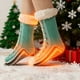 thumbnail image 1 of Calcetines calefactables recargables con carga USB | Control inteligente de temperatura y agarre antideslizante | Calcetines térmicos cálidos para hombre y mujer | Uso en invierno en interiores y e, 1 of 5