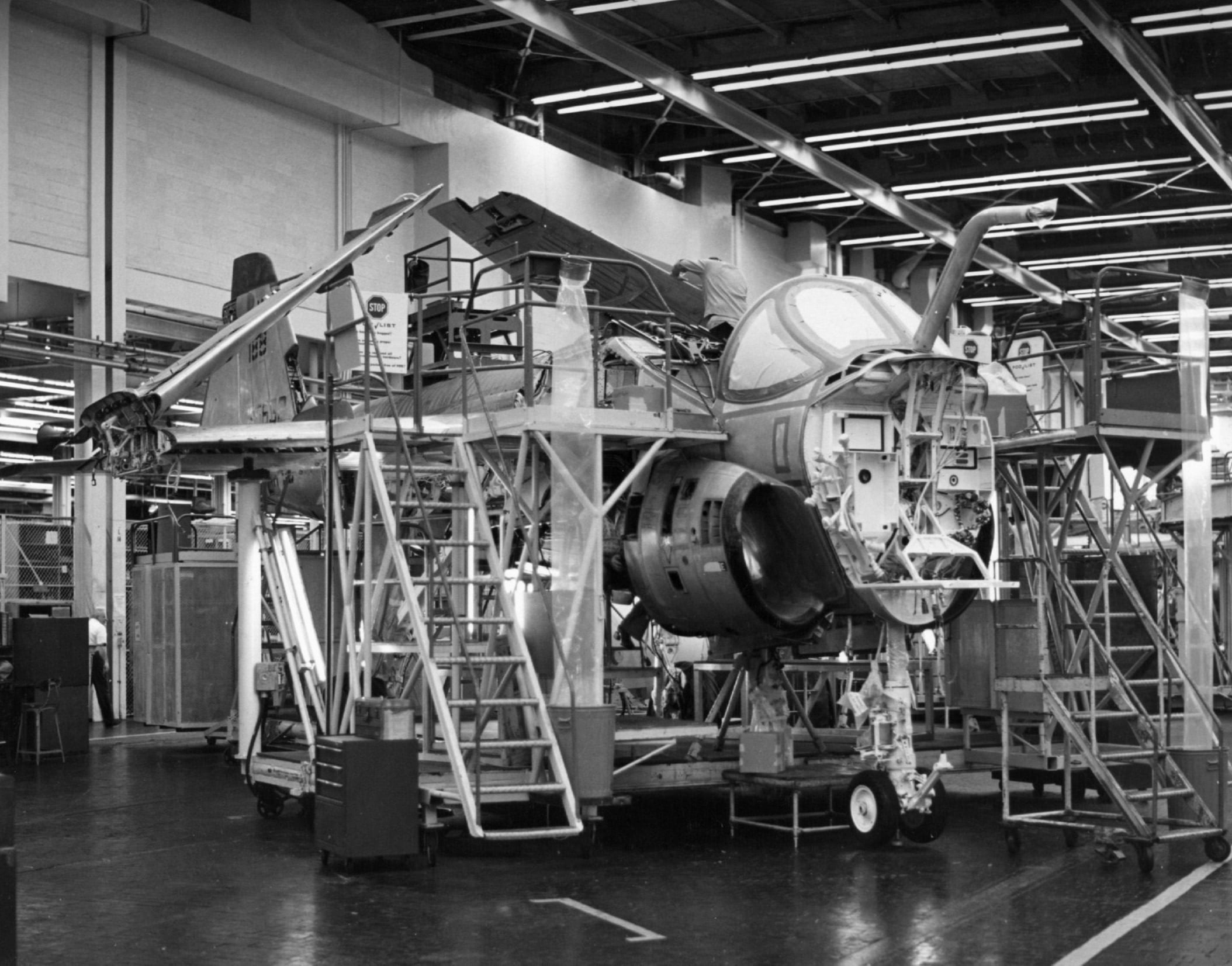 LAMINATED POSTER pictured on the assembly line at Grumman Corporation