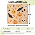 thumbnail image 2 of Stretch-fit Halloween tablecloth with elastic hem, designed for 36x36 inch square tables, features friendly pumpkin and ghost seasonal patterns, 2 of 6
