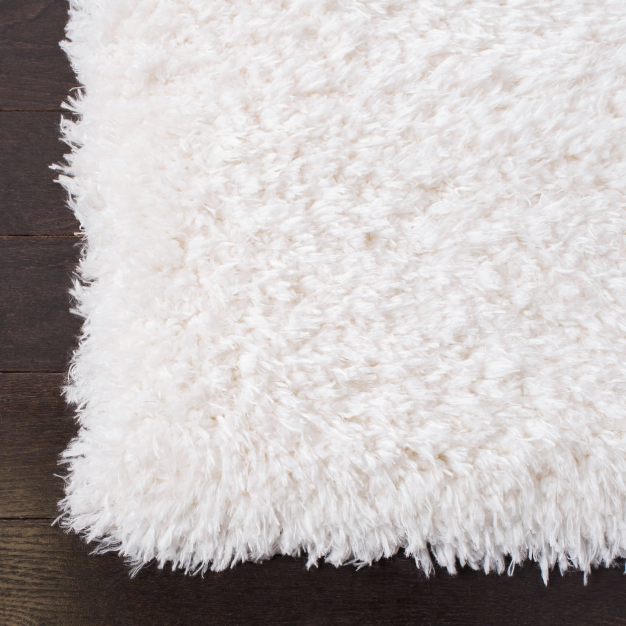 SAFAVIEH Flokati Lavena Solid Polyester Shag Area Rug, Ivory, 5'3" x 7'6"