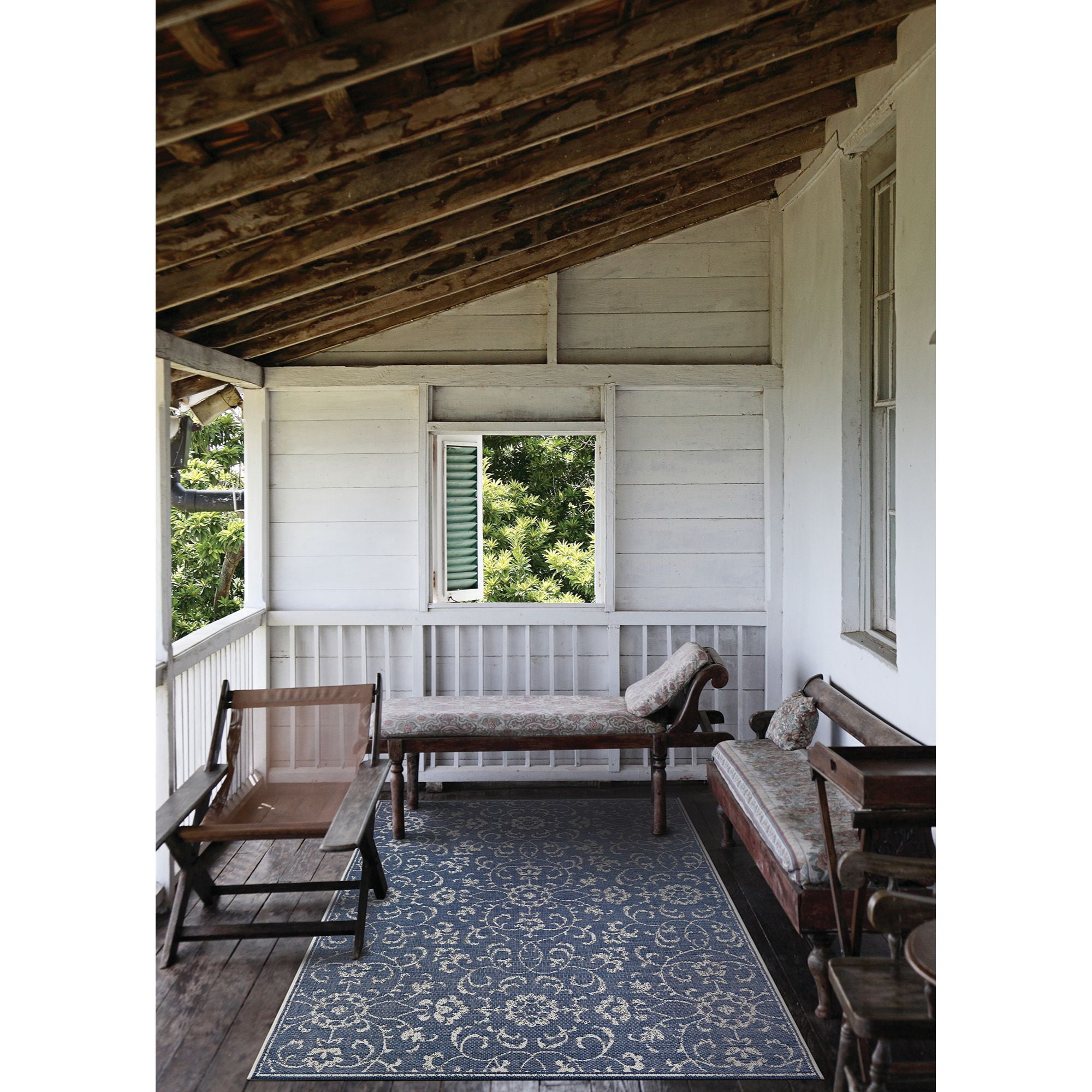 7.5' x 10.75' Navy Blue and Ivory Floral Rectangular Outdoor Area Throw Rug