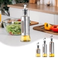 thumbnail image 1 of Bote dispensador de aceite de acero inoxidable con escamas - Crueta de aceite y vinagre de cocina impermeable para cocina, pico automático de vertido, diseño de vidrio y metal, 1 of 6