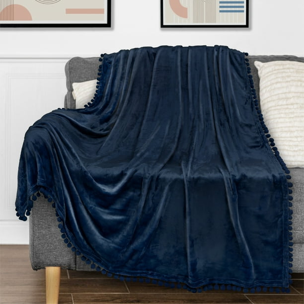 PAVILIA Fleece Throw Blanket for Couch with Pom Pom Fringe Navy Blue Soft Cozy Fuzzy Flannel Blanket for Sofa Bed Lightweight Plush All Season