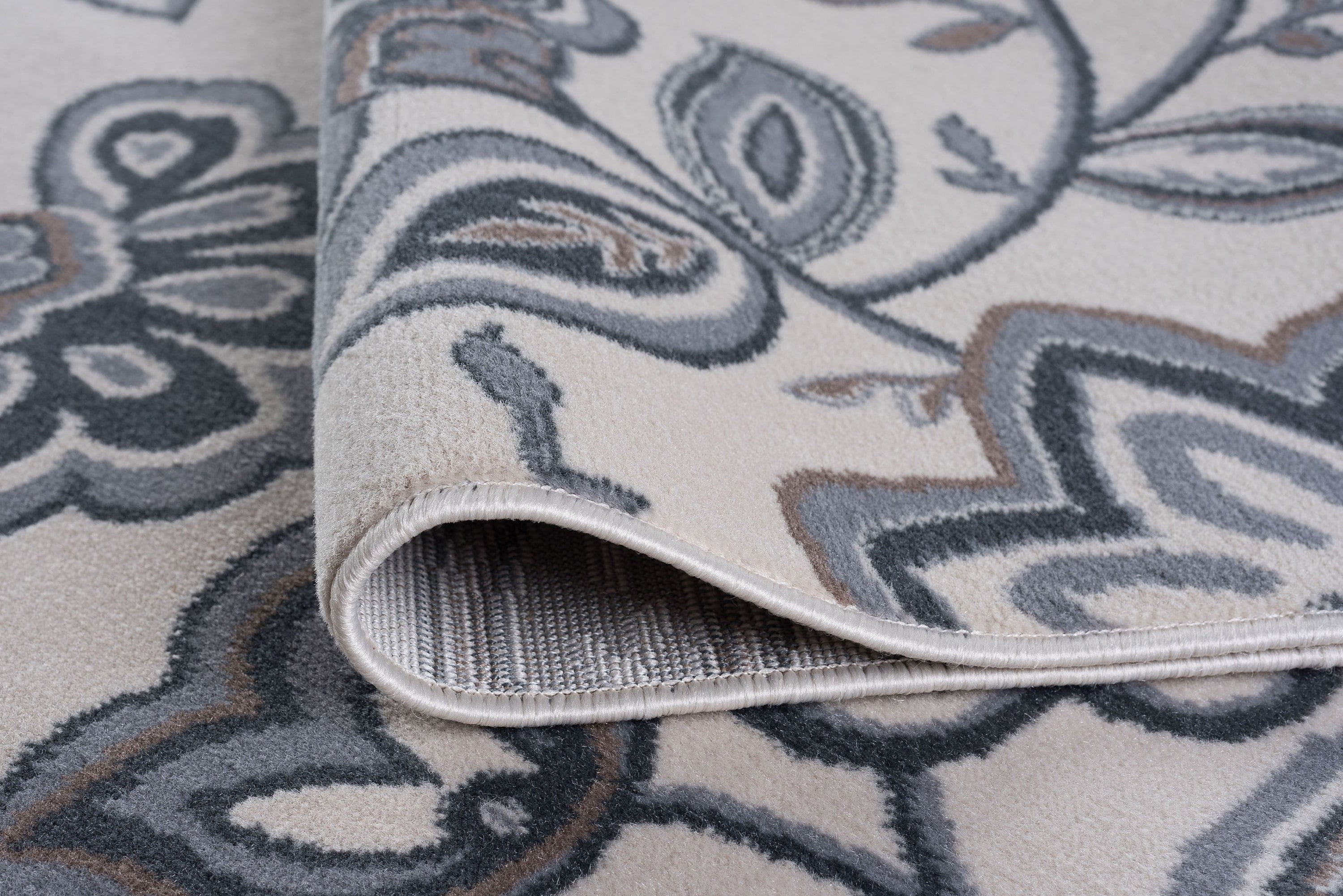 Madison Transitional 2' x 7' Cream and Gray Polypropylene Indoor Area Rug