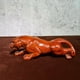 thumbnail image 1 of Rosewood carving is booming, featuring leopard-themed handicrafts, figurines, and home decor items made of mahogany., 1 of 3