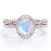 JeenMata Pave Halo Setting 1.75 Carat Oval Cut Blue Moonstone and Moissanite Infinity Twisted Shank Bridal Set in 18K Rose Gold Plating over Silver