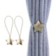 thumbnail image 1 of Paquete de 2 alzapaños magnéticos para cortinas de metal con imán para decoración del hogar y la oficina (bronce, estrella), 1 of 5