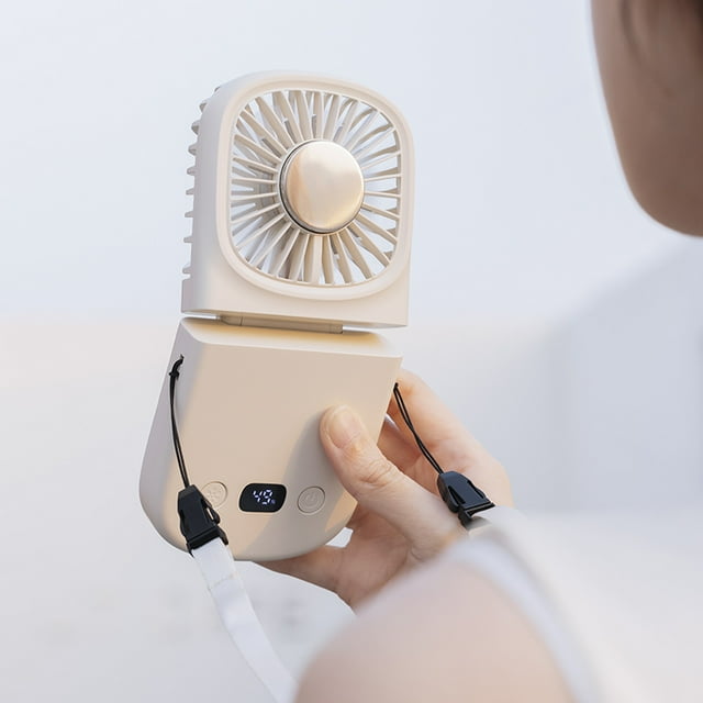 A Portable Fan with a Handheld Folding Fashion Fan And a Mobile Phone Charger