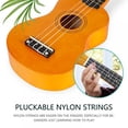 thumbnail image 5 of 21" Wooden Ukulele for Beginners, Starter Kit with Gig Bag, Strap, Tuner, Extra Strings, Cleaning Cloth, Picks, 5 of 9