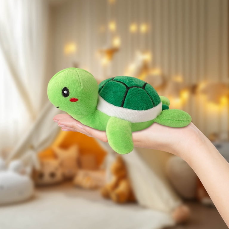 the cute little girl is hugging soft toy during walking Stock Photo