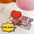thumbnail image 3 of Tapa de cerámica con forma de corazón para el botón de descarga del inodoro | Accesorio decorativo para baño | Adhesivo de fácil aplicación para manijas de inodoro, puertas y cajones, 3 of 3
