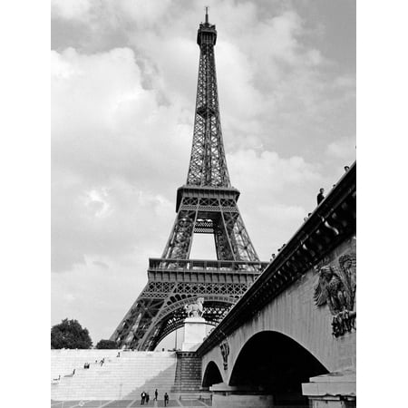 1920s Eiffel Tower with People Walking Up Stairs and Standing on Bridge in Foreground Print Wall