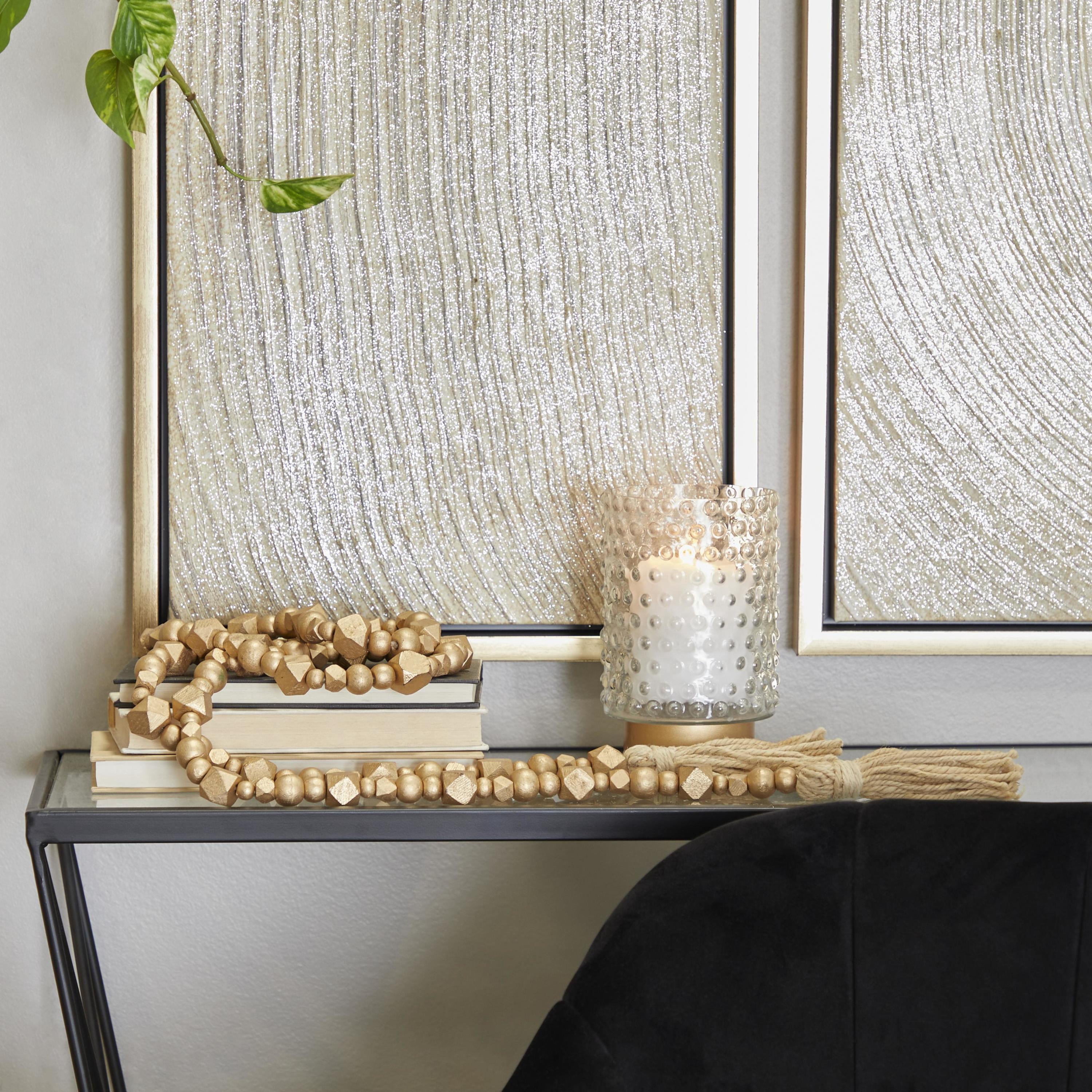 DecMode Handmade Hexagon Metallic Carved Geometric Long Gold Mango Wood Garland with Tassel