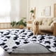 thumbnail image 4 of Alfombra DweIke 152x244 cm de Peluche Suave Estampado de Vaca en Blanco y Negro, 4 of 9