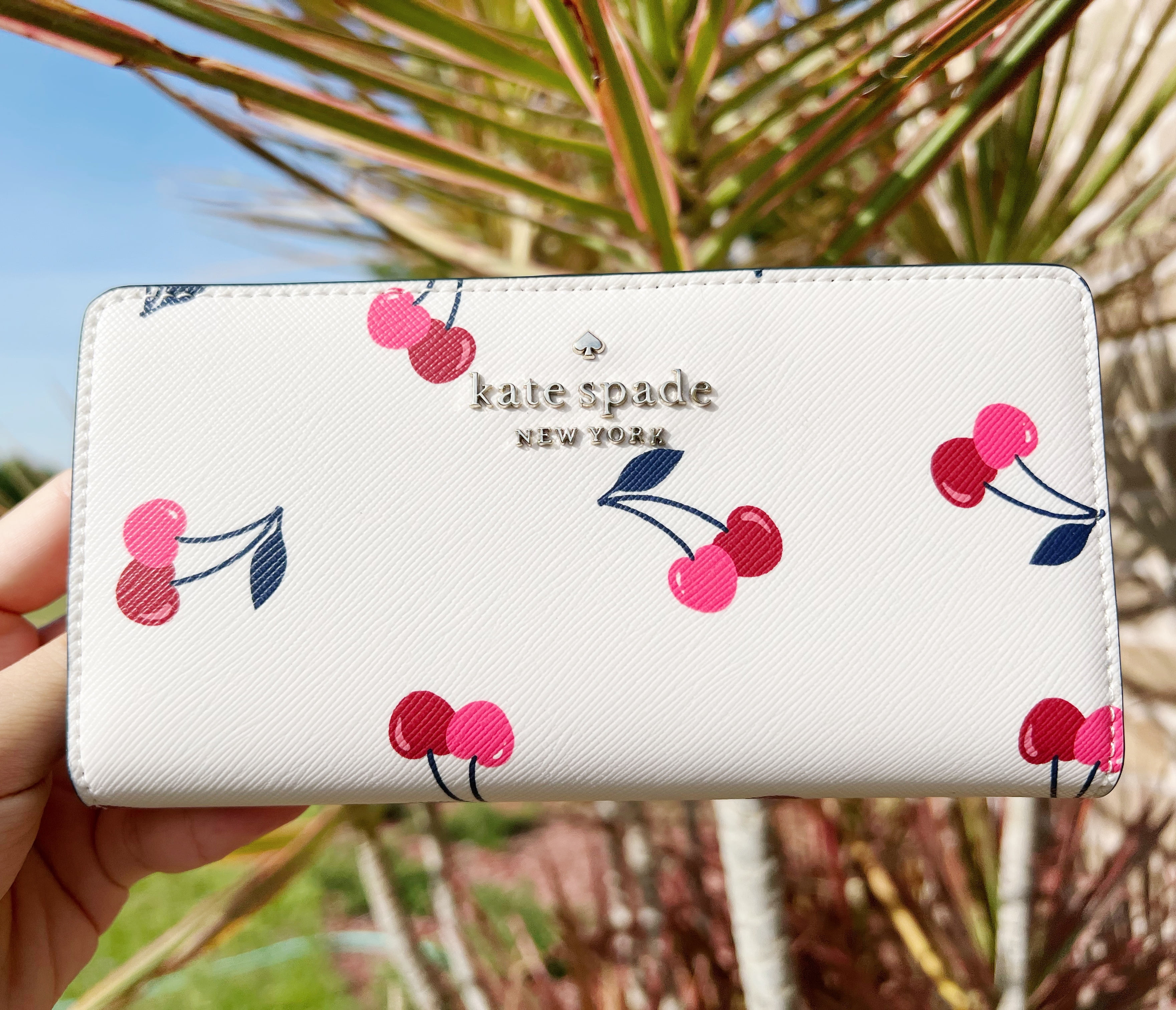 cream bifold wallet