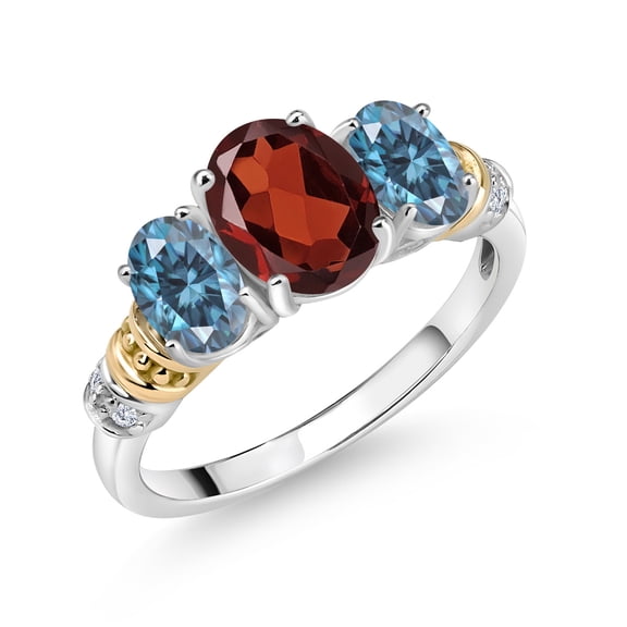 Gem Stone King 925 Sterling Silver and 10K Yellow Gold Oval Red Garnet Persian Blue Moissanite and White Diamond 3 Stone Ring for Women (2.43 Cttw, Gemstone January Birthstone, Size 7)