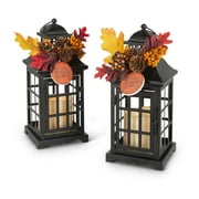 Gerson Set of 2 black metal lanterns with B/O LED candles and floral accents