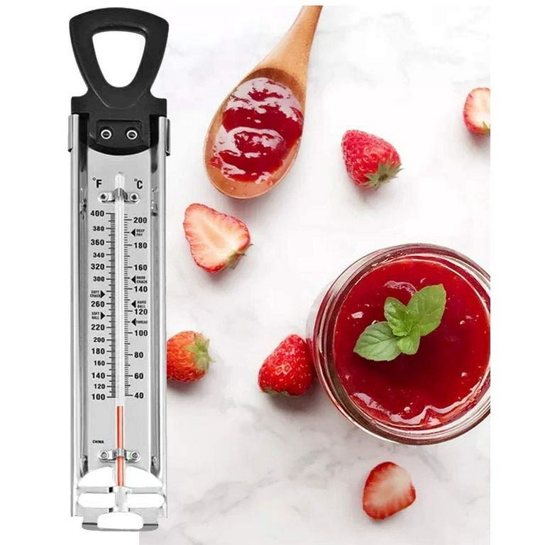 Candy Thermometer In Modern Metal Pot With Red Handles With