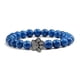 thumbnail image 1 of Pulsera con dije de huella de pata de piedra volcánica de lava negra mate natural, ideal como recuerdo para mascotas, amantes de los gatos y los perros., 1 of 2