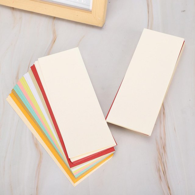 Qiilu Pearlescent Paper, Metallic Cardstock Paper, featuring 100 sheets of metallic paper in 10 assorted colors. Each sheet measures approximately 16 x 6 cm (6.3 x 2.4 inches). The paper is displayed in a fan arrangement, showcasing vibrant colors like red, yellow, green, and white, with a smooth, pearlescent finish. Ideal for crafting, scrapbooking, invitations, and high-end printing projects.