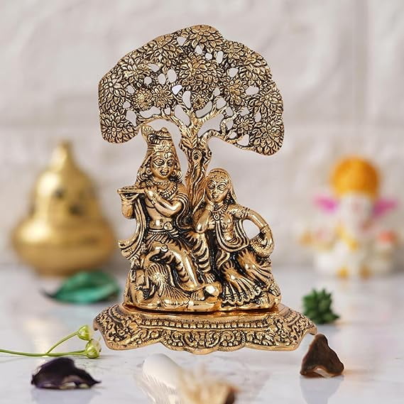 Swadeshi Desire Metal Radha Krishna Sitting Under Tree Plying Flute Decorative Showpiece for Home and Office Decor - 14 cm