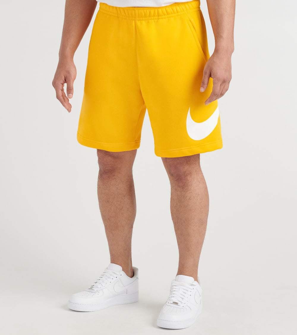 yellow nike fleece shorts
