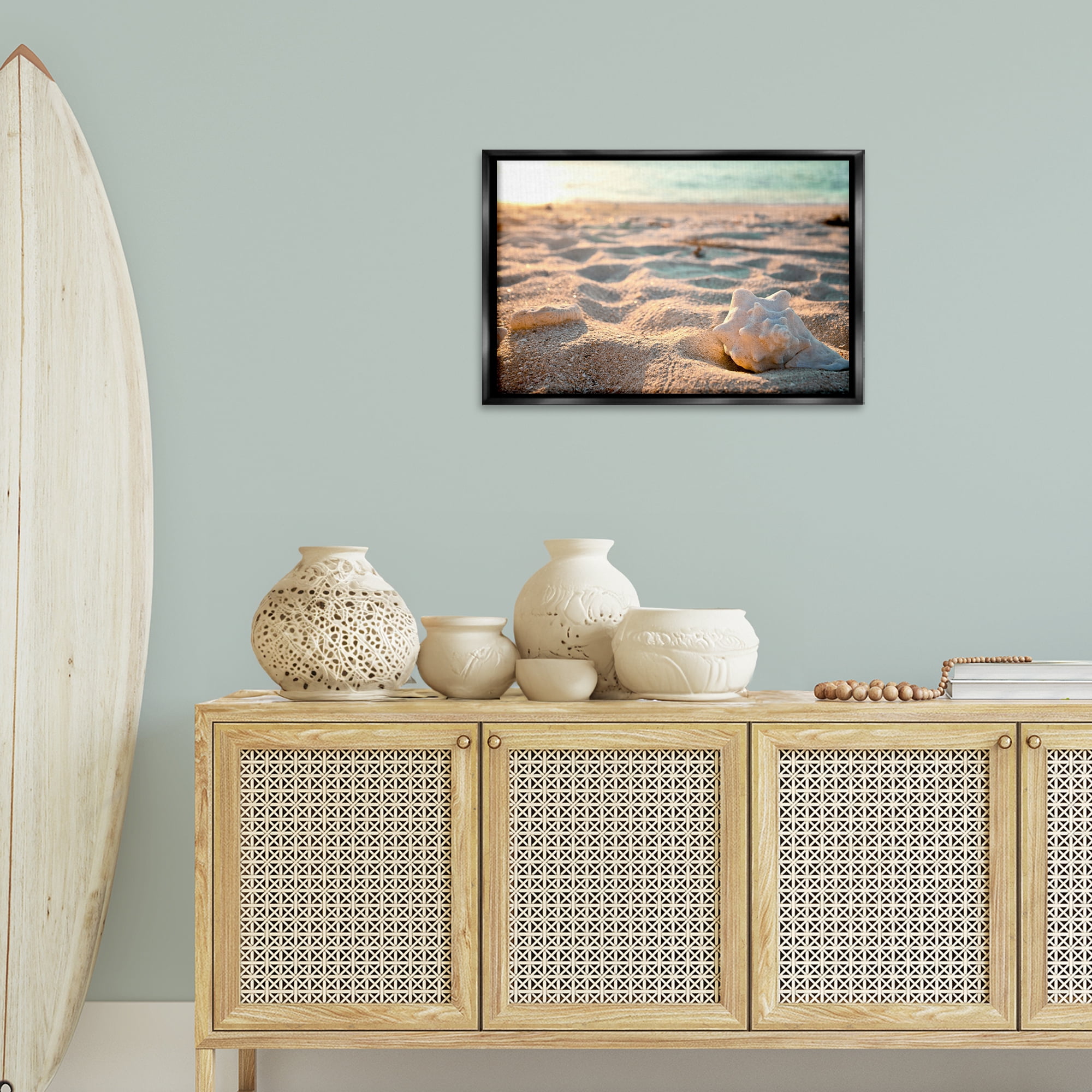 Stupell Industries Conch Shell in Sand Coastal Photography Black Floater Framed Canvas Art Print Wall Art, 25 x 17
