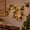 B, variant on Qwtwty 6 ft Christmas Decor Artificial Garland with Lights, Fake Vines Real Touch Artificial Norfolk Garlands for Mantle, Fireplace, Table Decor