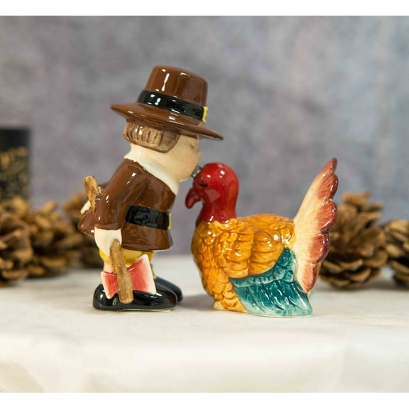 Thanksgiving Pilgrim With Axe Kissing Turkey Ceramic Salt and Pepper Shakers Set