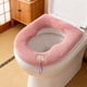 thumbnail image 5 of Cubierta de asiento de váter mullida en forma de calabaza • Tela de forro polar • Cálida y suave • Mango extraíble • Encaja en 42x37cm • Morado, gris, rosa • Comodidad para todo tipo • Fácil de, 5 of 6