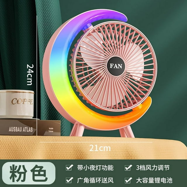 colorful running lights usb rechargeable desktop fan home office mute desktop fan deals of the day clearance gifts for womem/men Rosa ventilador de escritorio recargable USB con aro LED multicolor en forma de media luna, vista frontal 3/4; rejilla circular y aspas plásticas rosas, base trípode, centro marcado "FAN", dimensiones 24 cm × 21 cm, incluye cable USB; adecuado para casa, oficina o viaje.