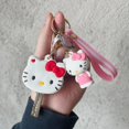 thumbnail image 1 of Funda para llavero de Hello Kitty Melody, cubierta antipolvo para Control de llaves, organizador de soporte Kawaii de dibujos animados, suministros para el hogar, 1 of 4