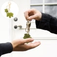 thumbnail image 1 of unbranded Llavero Pendiente Con Hoja De Arce Y Para, 1 of 6
