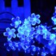 thumbnail image 4 of Luces de hadas de flor de durazno para exteriores con energía solar, 50 LED, 7 m, impermeables IP65, con 8 modos para interiores y exteriores, jardín, Navidad, terraza, patio, fiesta., 4 of 4