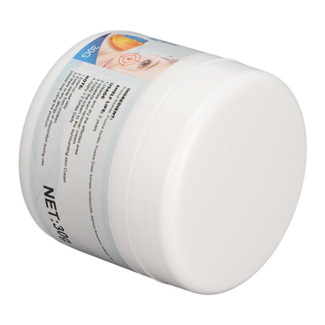 crema para eliminar verrugas natural, fórmula reparadora de la piel de rápida absorción, suave y eficaz, de 30 g, para uso doméstico tarro blanco cilíndrico visto en ángulo 3/4 con tapa plana y etiqueta lateral con texto, franja azul y marcado "30g", superficie lisa, envase portátil indicado para aplicación tópica en manos, pies y cutículas; también adecuada para suavizar cutículas.