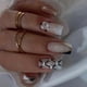 thumbnail image 1 of 24 Pcs Artificial Nail Set in Black White V Tip French Style Heart Accents Glossy Finish ABS Plastic for Quick Manicure, 1 of 4
