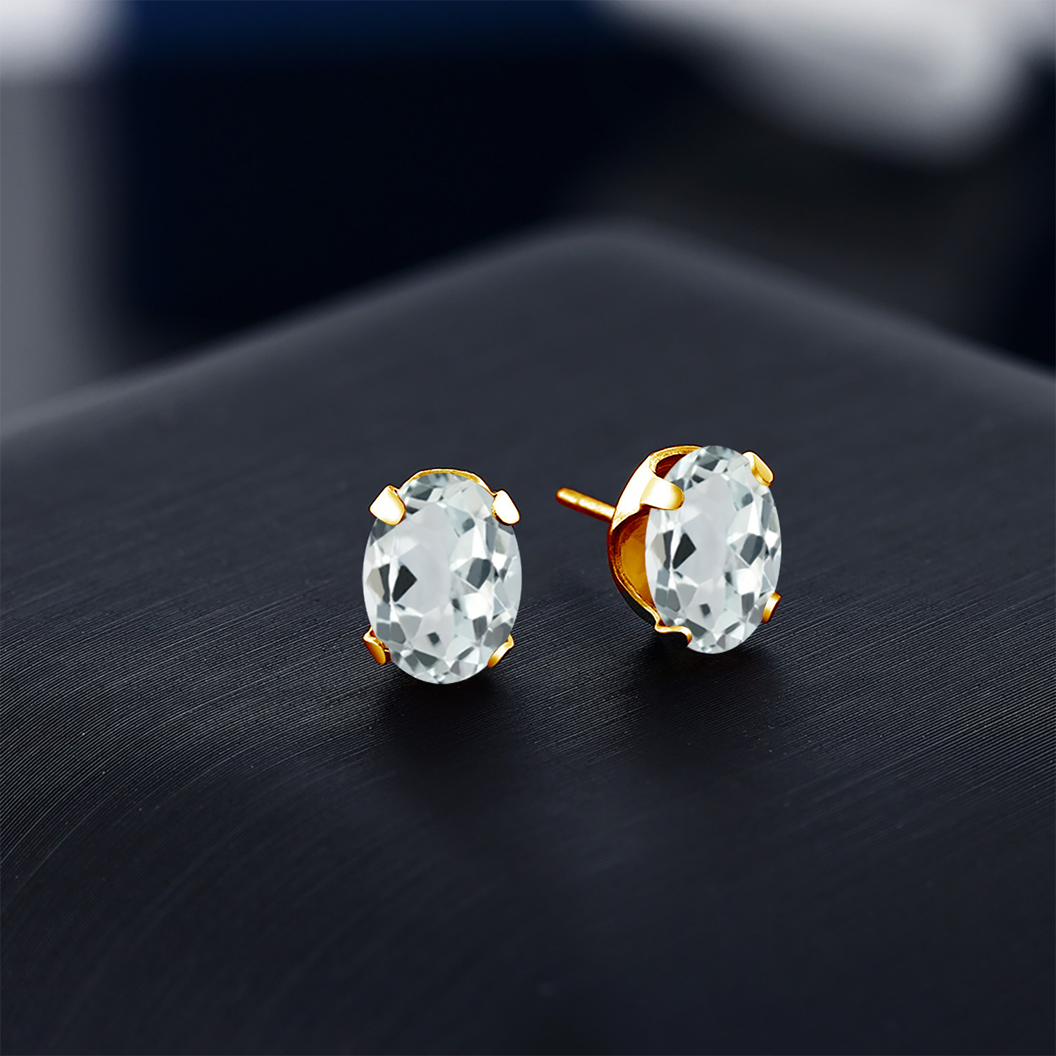Gem Stone King 18K Yellow Gold Plated Silver Sky Blue Aquamarine Stud Earrings for Women Men | 2.40 Cttw | Gemstone March Birthstone | Oval 8X6MM