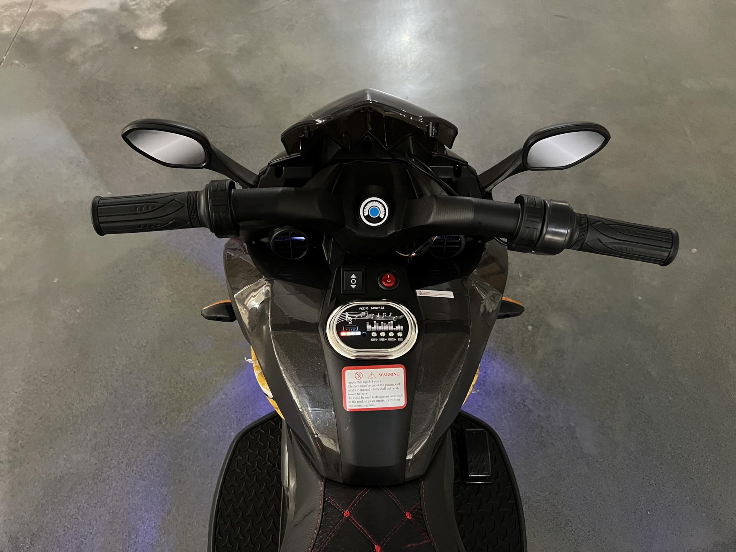 HappyToysWorldKids Electric Motorcycle 3 Wheels, Ride On Toy with App Control & Music, Light-Up Wheels for Boys Girls Ages 3-8, Battery Powered Motorbike with Safety Training Wheels