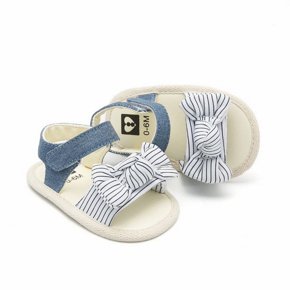 white newborn baby shoes