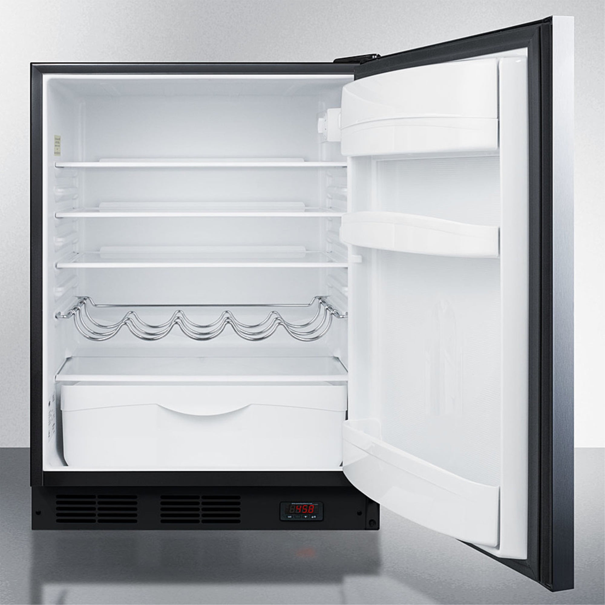 Built-in undercounter ADA compliant craft beer Pub Cellar with black cabinet, stainless steel door, horizontal handle, digital thermostat, and deluxe interior