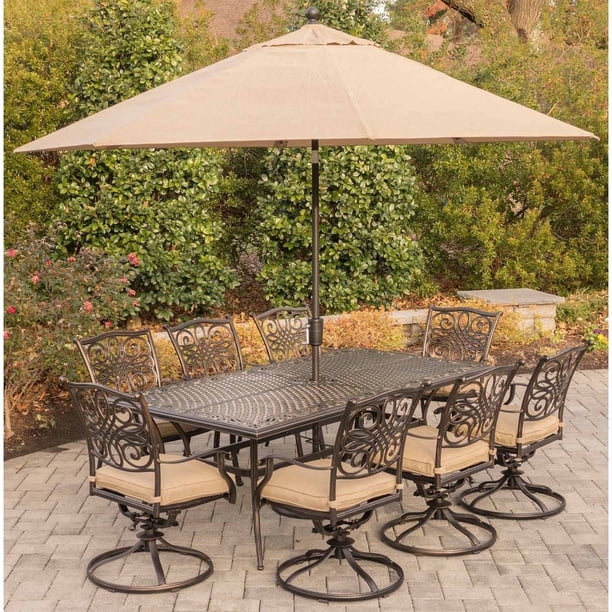 Hanover Outdoor Traditions 9 Piece Dining Set With 42 X 84 Cast Top Table 8 Swivel Rockers And Umbrella With Stand Natural Oat Walmart Com Walmart Com