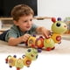 thumbnail image 1 of Decoraciones Oruga musical giratoria con luz para bebés y niños pequeños, juguete educativo para el desarrollo sensorial con sonido y luces (1 unidad) JASKFLY, 1 of 5