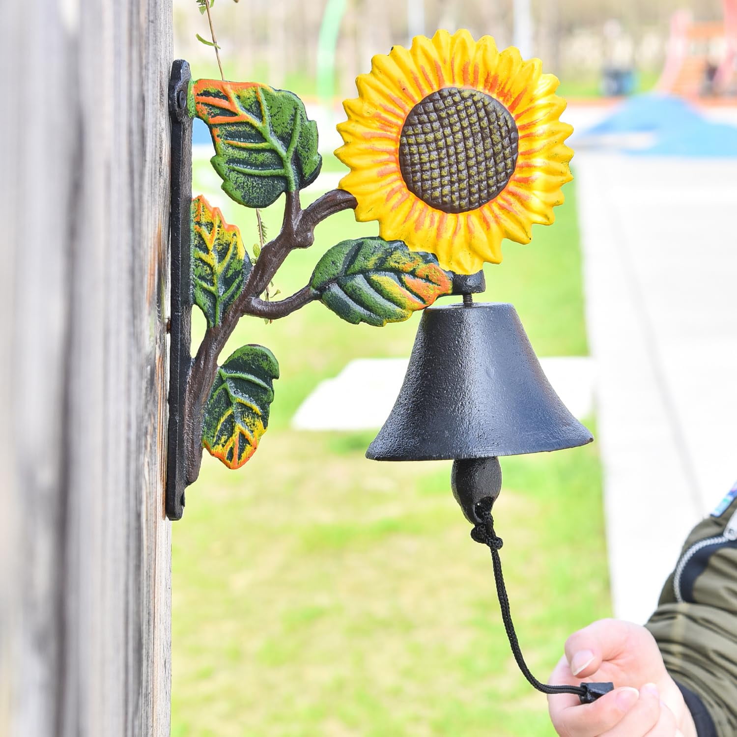 Sungmor Cast Iron Wall Bell Decorative Hand-Painted Sunflower Hand Bell, Manually Shaking Wall Hanging Doorbell - Indoor Outdoor Wall Mounted Dinner Bell - Garden Home Wall Decoration