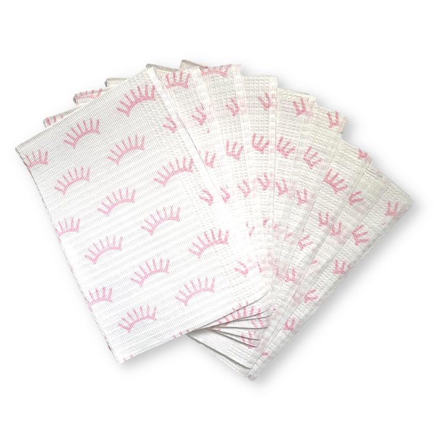 Babero dental de amarre desechable | Paquete de 125 | Tamaño 13x18" pulgadas | Suministros para extensiones de pestañas | Babero blanco con diseño de estampado de pestañas rosas