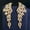 Yellow Gold Plated, variant on Yellow Gold Cubic Zircon 925 Silver Leaf Long Dangle Feather Wing Women Earrings