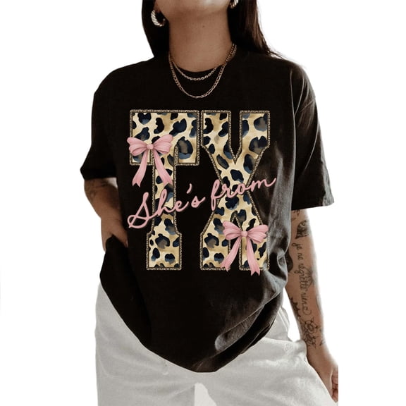 She’s From Texas T-Shirt – Coquette Leopard Bow Graphic Tee, Texas Girl Outfit Gift for Southern Women & Moms, Unisex Cotton Top
