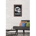 thumbnail image 2 of NFL Las Vegas Raiders - Neon Helmet 23 Wall Poster, 14.725" x 22.375" Framed, 2 of 5