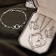 thumbnail image 1 of Juego de joyería de aretes y pulsera de colgante en forma de corazón plateado, 1 of 7